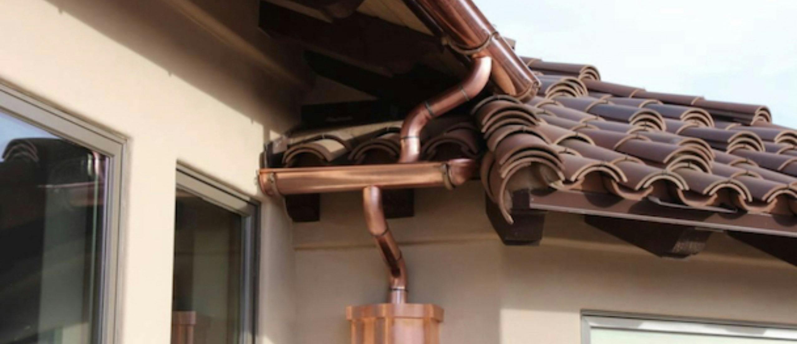 Copper gutter and downspout